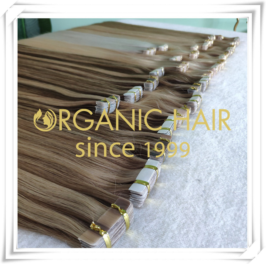 Different colors of tape in hair extensions C062