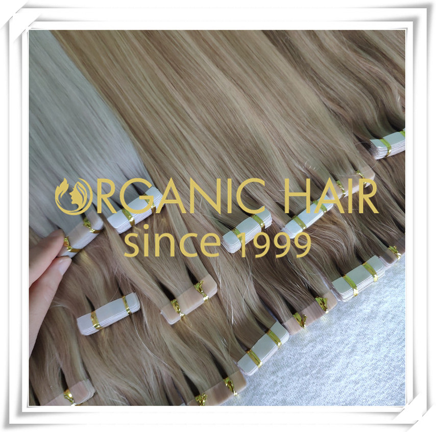 Different colors of tape in hair extensions C062