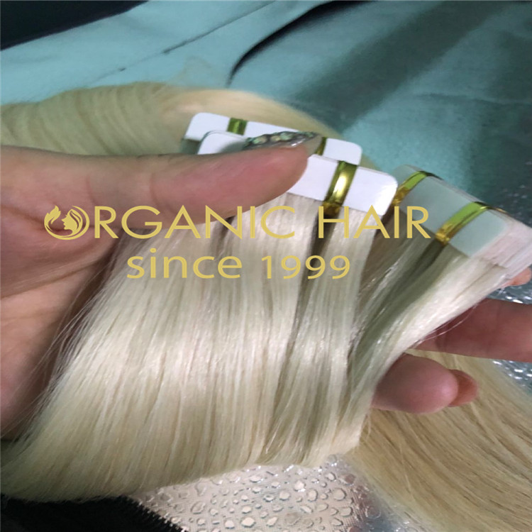 Blonde tape in hair extensions H269