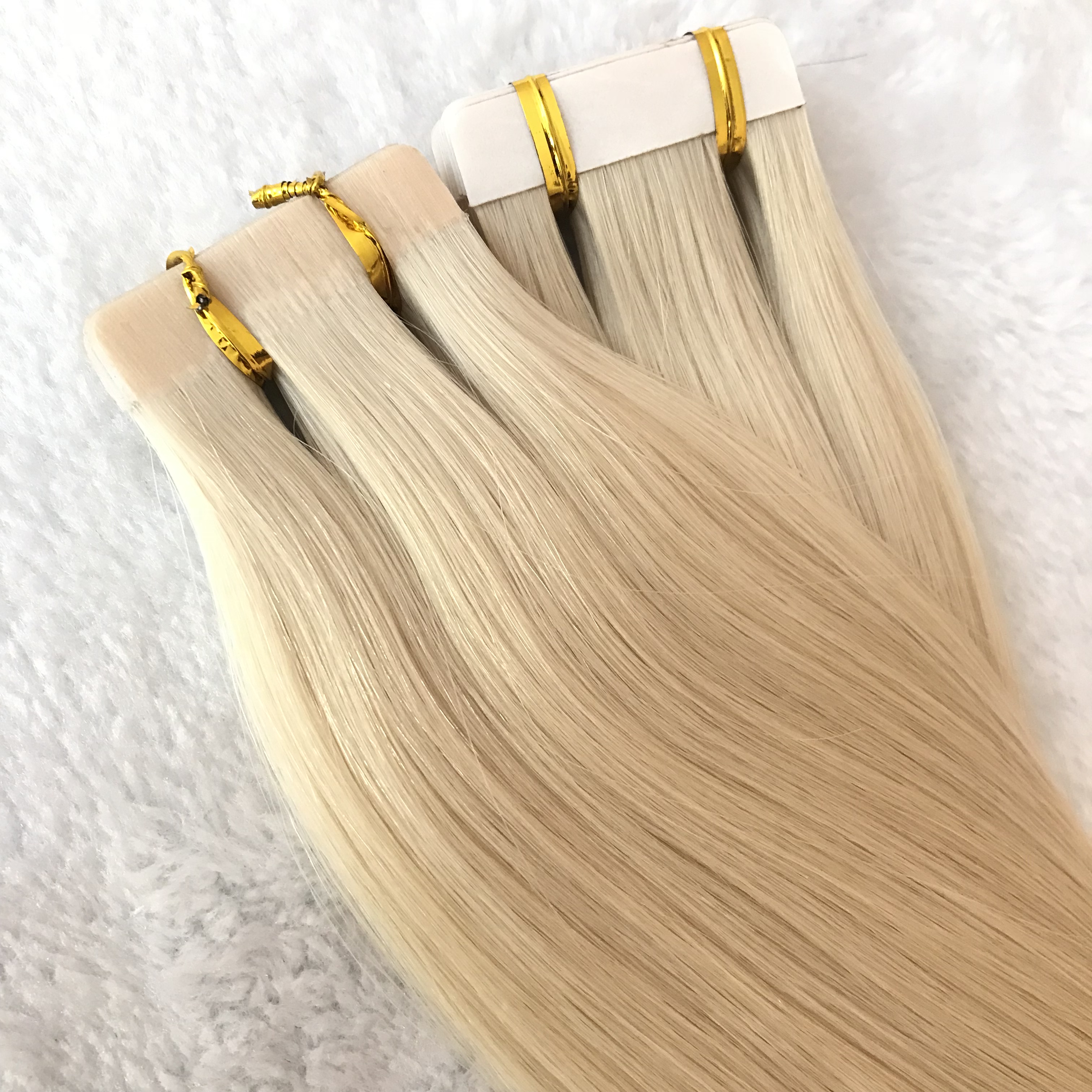 Hot sale wholesale blonde color human tape in hair X300