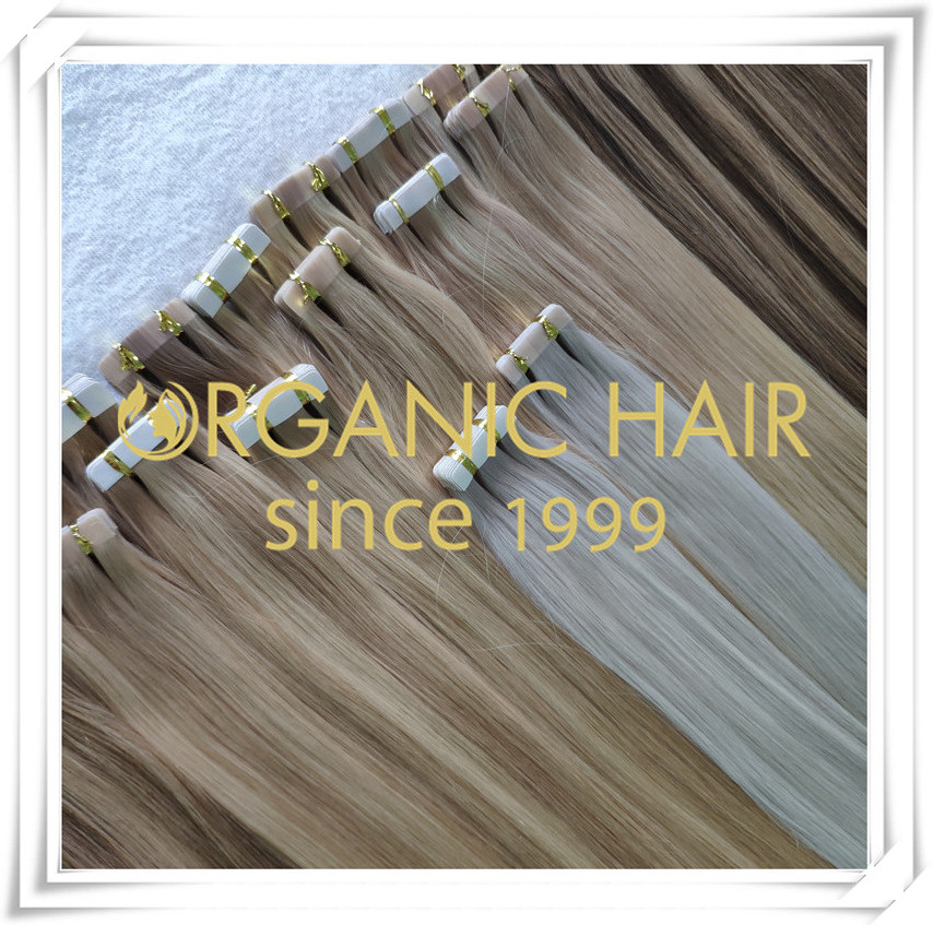 Different colors of tape in hair extensions C062